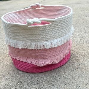 a hot pink light pink and white basket